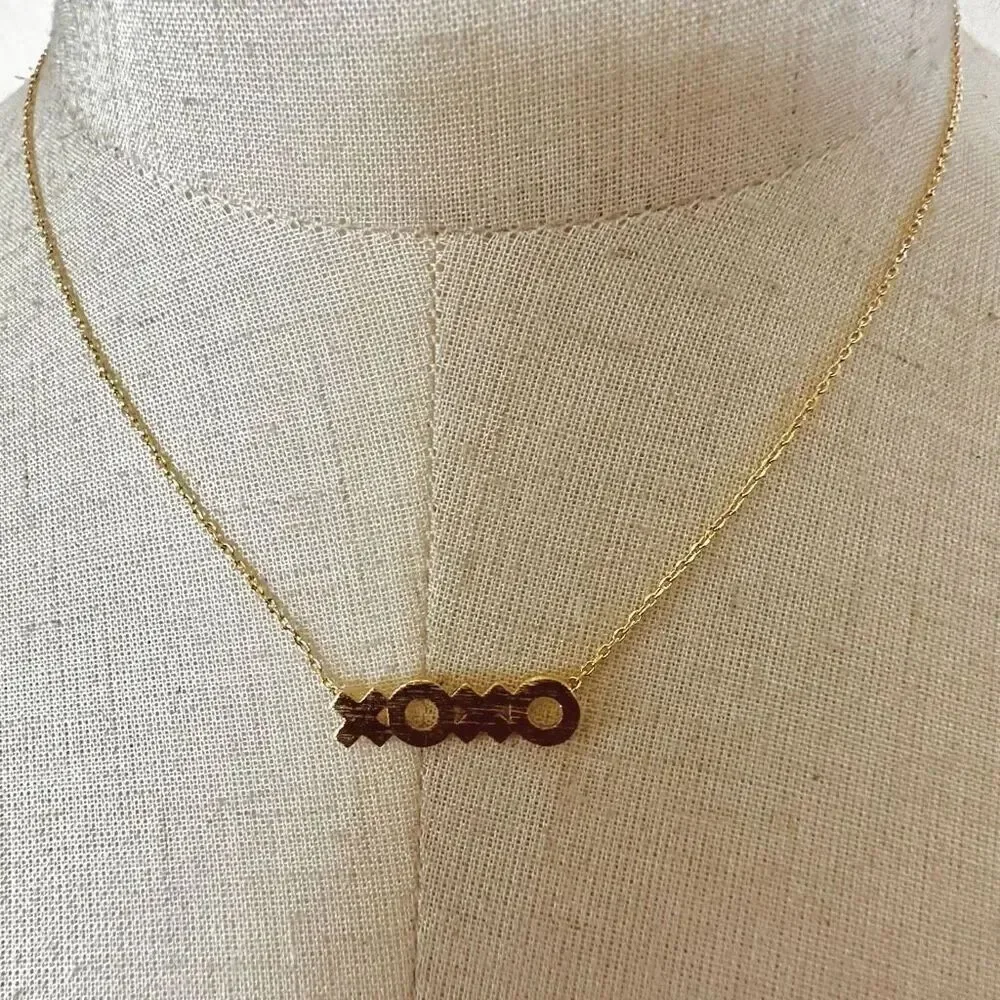 Gold tone XOXO pendant dainty necklace